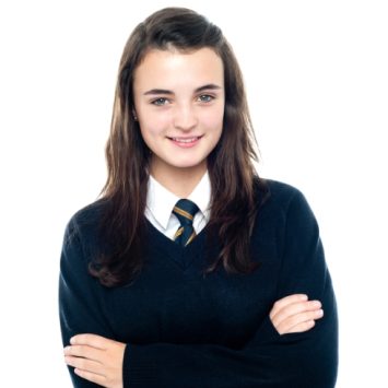 Photo of young teenaged girl wearing school uniform